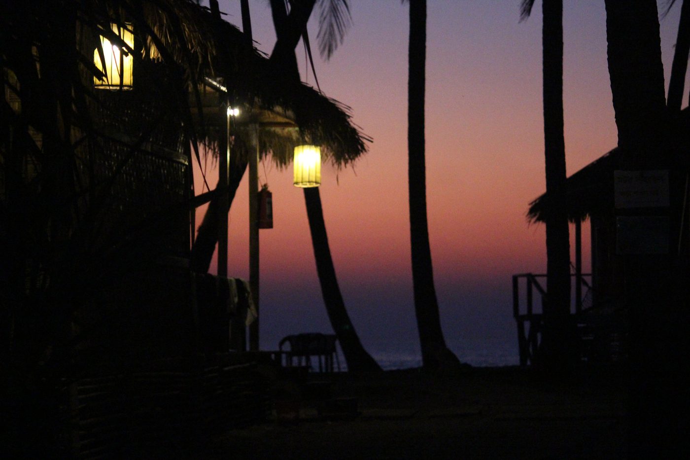 Lanterns at dusk on the beach
