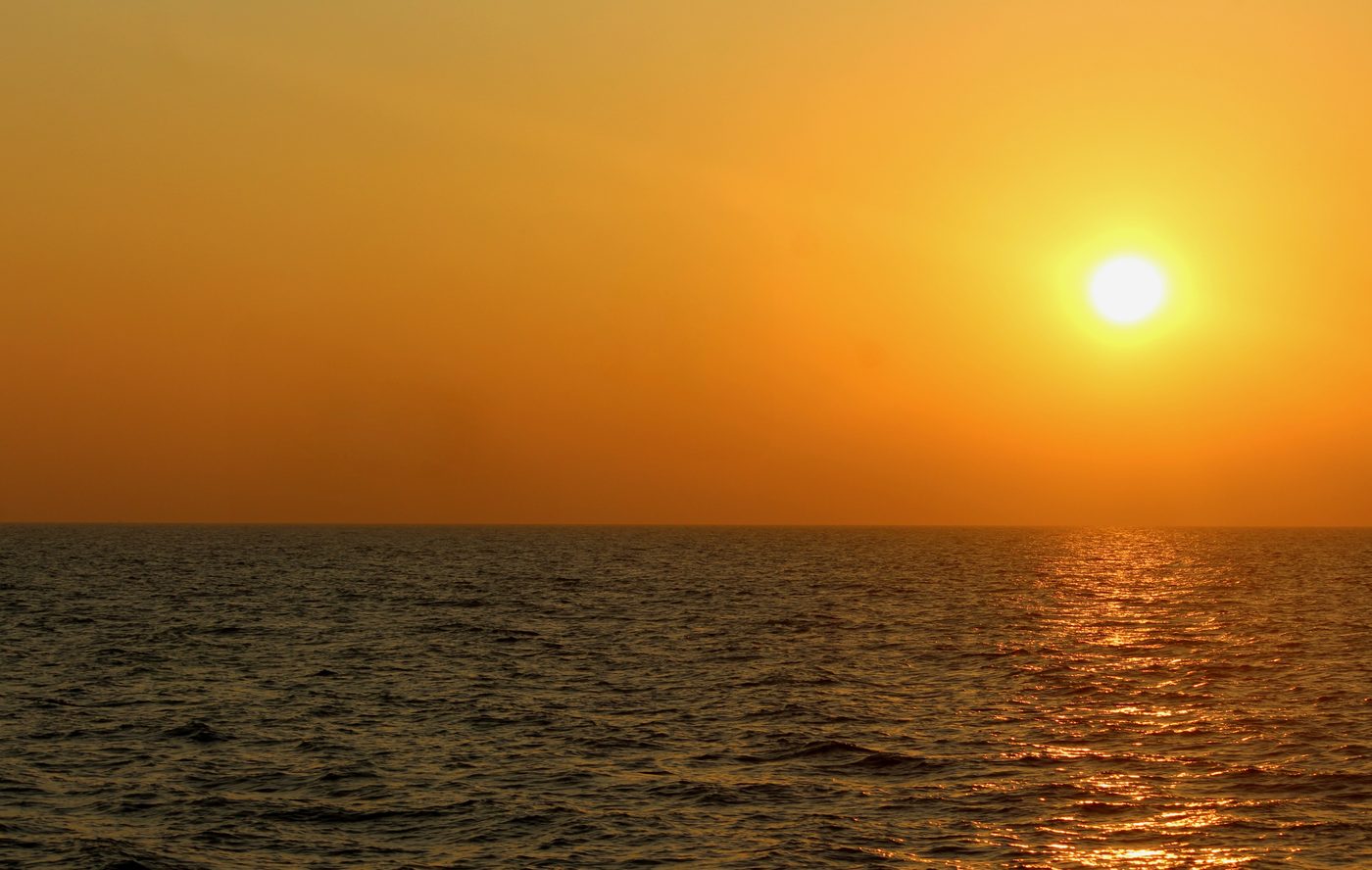 Sun setting over the ocean